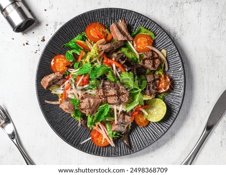 Image, Stock Photo Beef thai salad served on dish