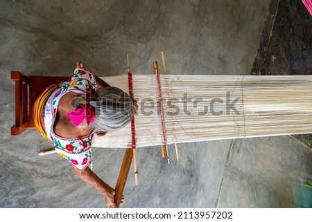 Woman waist weaving a beautiful traditional cotton fabric Stock foto © 