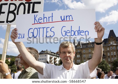 STUTTGART - JULY 31 : Pius religious brothers in the fight against the Christopher Street Day. July 31, 2010 in Stuttgart, Germany.