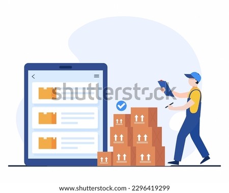Checking boxes. Worker checking stock inventory and making notes before shipping using tablet concept of Inventory control system.