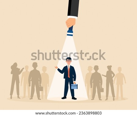HR hand holding light indicates choosing the best employee among other candidates concept of Choosing the ideal candidate.