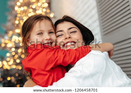 Similar – Image, Stock Photo Tree cuddling | woman hugging a pine trunk