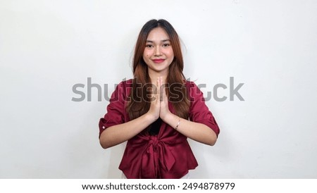 Similar – Image, Stock Photo Young blonde asian woman in knitted turtleneck sweater with fairy lights and bokeh around