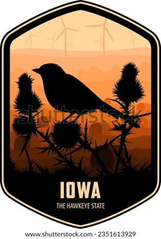 Iowa vector label with eastern goldfinch on thistle and field with hay bales and wind turbines