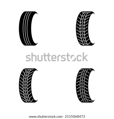 Set of four monochrome vector tire icons or pictograms on white background. Pneumatic symbols.