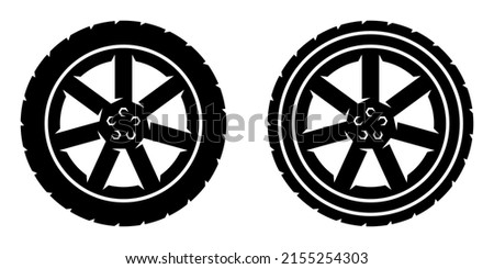 Two vector black icons of tire silhouettes with disks and screws on a white background. Monochrome car wheel symbols.