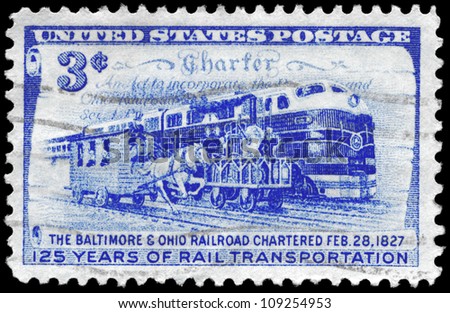 USA - CIRCA 1952: A Stamp printed in USA shows the Charter and Three Stages of Rail Transportation, 125th anniversary issue of the Baltimore and Ohio Railroad chartered, circa 1952
