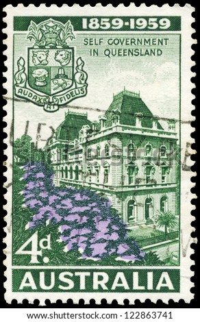 AUSTRALIA - CIRCA 1959: A Stamp sheet printed in Australia shows the Parliament House, Brisbane, and Arms of Queensland, Centenary of Self-Government, circa 1959