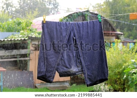 Image, Stock Photo Clothespin on rain wet clothesline