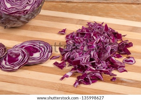 Kitchen board with freshly chopped red cabbage
