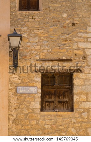 Facade detail inside medieval town of Mirambel, Teruel, Spain