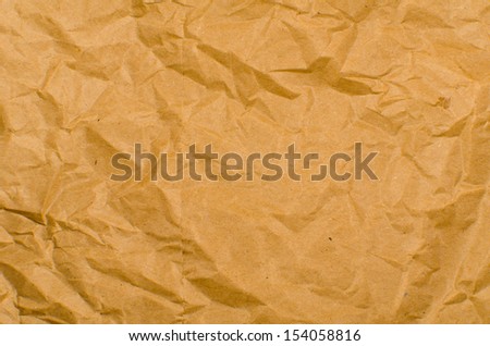 Full frame take of crumpled brown wrapping paper