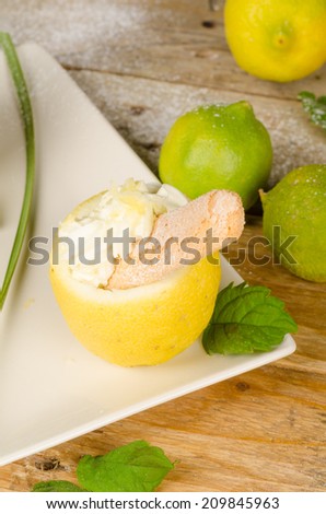 Homemade lemon sorbet served inside an empty lemon half