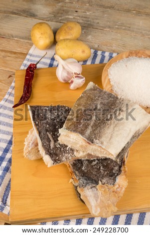 Dried cod and ingredients to prepare a traditional fish recipe