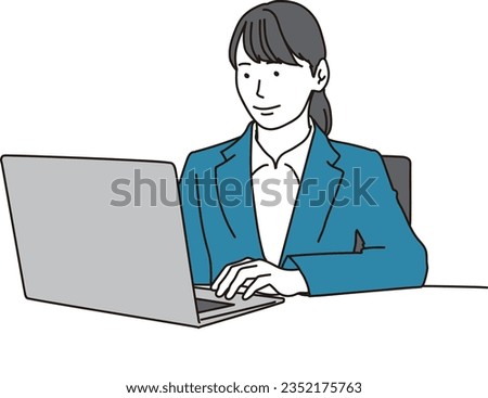 business woman operating a laptop