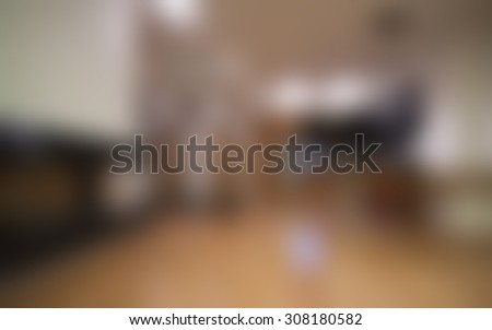 Blurred living room/sitting room background.