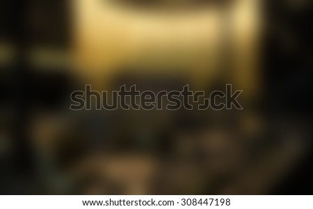 Blurred living room/sitting room background.