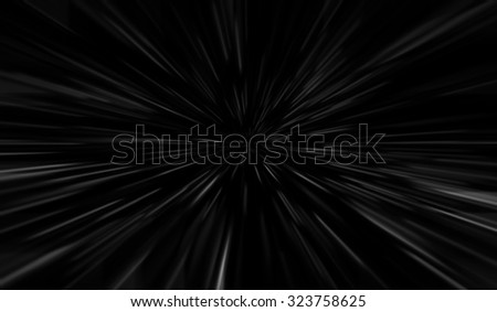 Light particles in zoom effect. Radial motion blur / zooming effect.
