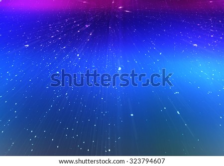 Light particles in motion effect. Vertical motion blur.