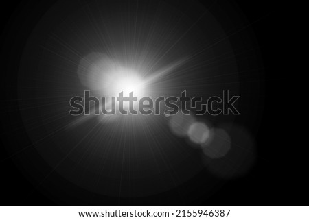 Sun Light Overlay. Sun rays overlay. Sun rays light isolated on black background for overlay design. transparent sunlight special lens flash light effect. front sun lens flash. light of radiance. Foto stock © 