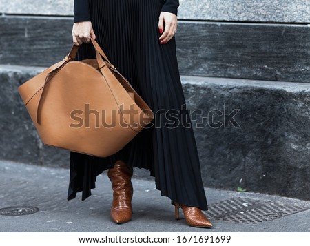 Similar – Image, Stock Photo Woman in stylish boots with red suitcase standing on road