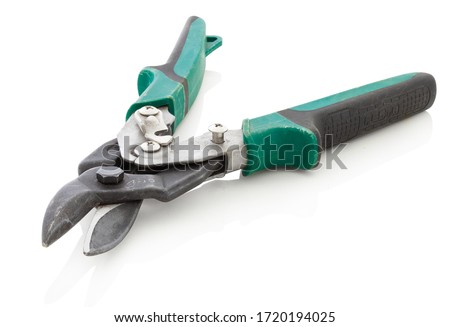 Modern metal cutting scissors. Tin snips. Plate shears, aid for sheet metal cutting or wire cutting. Metal cutting shears with ergonomic handles. Isolated on white bg. with clipping (vector) path. Stockfoto © 