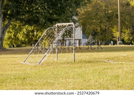 Similar – Image, Stock Photo old soccer goal sports equipment on the field