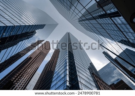 Similar – Image, Stock Photo Low angle view of rows of neoclassical balconies on the facade of a residential building