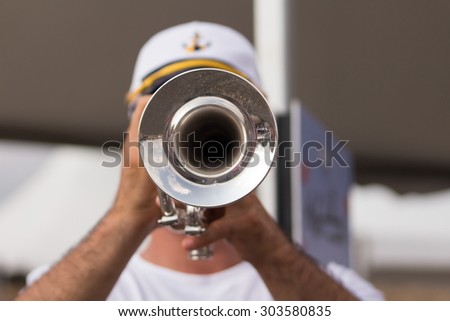 man playing trumpet