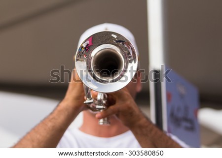 man playing trumpet