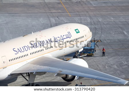 Istanbul, Turkey, September 07, 2015: Saudi Arabian Airlines Boeing 777 push back operation detail at Istanbul Ataturk Airport.