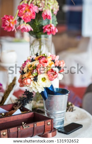 decoration of wedding table.floral arrangements and decorations.arrangement of hydrangeas and roses in vases