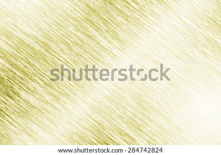 Metal gold background or texture of brushed steel plate with reflections
