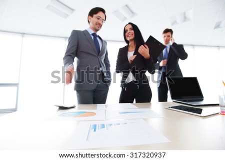 business people at office behind the desk