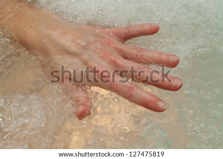 the water massage of tired hands