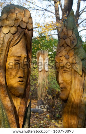 WISLA, POLAND - OCTOBER 08, 2013 : Fairy-like wooden figures from primaeval Slawic tales by Grzegorz Michalek