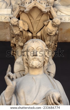 Paris, France - September 8, 2014: Paris -  the Sainte-Chapelle (Holy Chapel).The base of the portal on both sides is decorated with low relief representing scenes of the Genesis