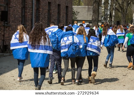 OSWIECIM, POLAND - APRIL 16, 2015: International Holocaust Remembrance Day . Annually people from the all the world meet on the March of the Living in german Concentration Camp in Auschwitz Birkenau