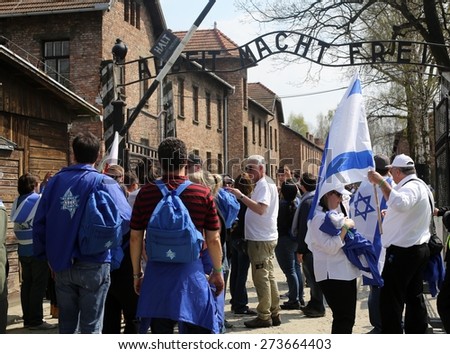 OSWIECIM, POLAND - APRIL 16, 2015: International Holocaust Remembrance Day . Annually people from the all the world meets on the March of the Living in german Concentration Camp in Auschwitz Birkenau.