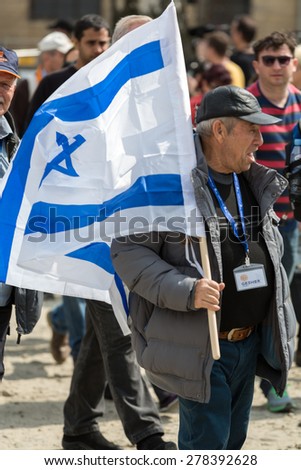 OSWIECIM, POLAND - APRIL 16, 2015: International Holocaust Remembrance Day . Annually people from the all the world meets on the March of the Living in german Concentration Camp in Auschwitz Birkenau