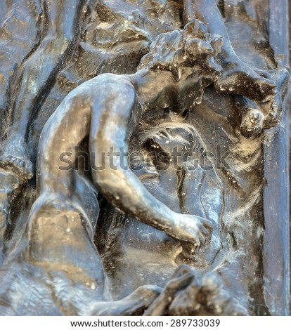 PARIS, FRANCE - SEPTEMBER 12, 2014: Paris - Museum Rodin. The Gates of Hell is a monumental sculptural group work by Rodin that depicts a scene from \