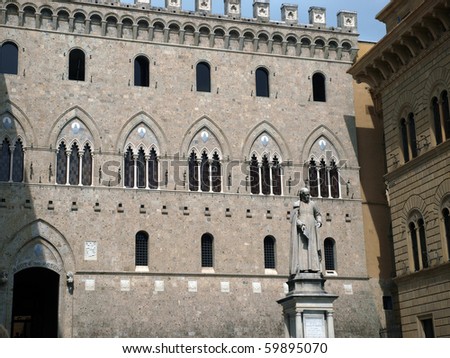 Siena - Salustio Bangini monument on the background of magnificent architecture