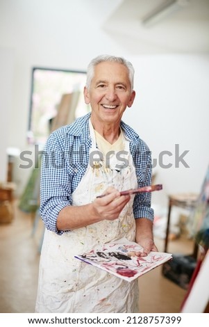 Similar – Image, Stock Photo Crop man painting on studio floor