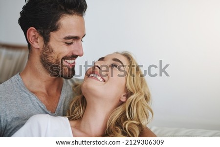 Similar – Image, Stock Photo happy couple in love at home. Afro american woman, caucasian man and their pit bull dog together. Family concept