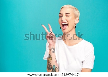 Image, Stock Photo Playful trendy woman on street in sunshine covering camera with hands