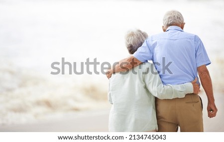 Similar – Image, Stock Photo Unrecognizable traveler on beach on cloudy day
