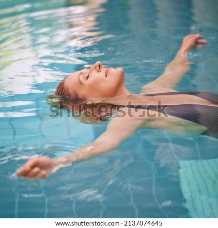 Similar – Image, Stock Photo Caucasian lady floating in turquoise sea.