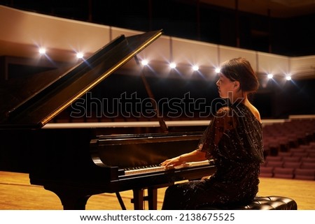 Similar – Image, Stock Photo Crop woman playing piano at home