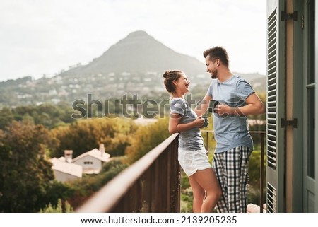 Similar – Image, Stock Photo View of authentic balcony. Carpets hang on balcony in the sun. Facade of residential building, copy space