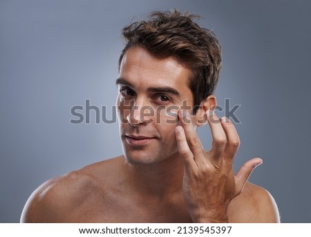 Image, Stock Photo shirtless caucasian young man wearing turquoise shorts in a park in summer